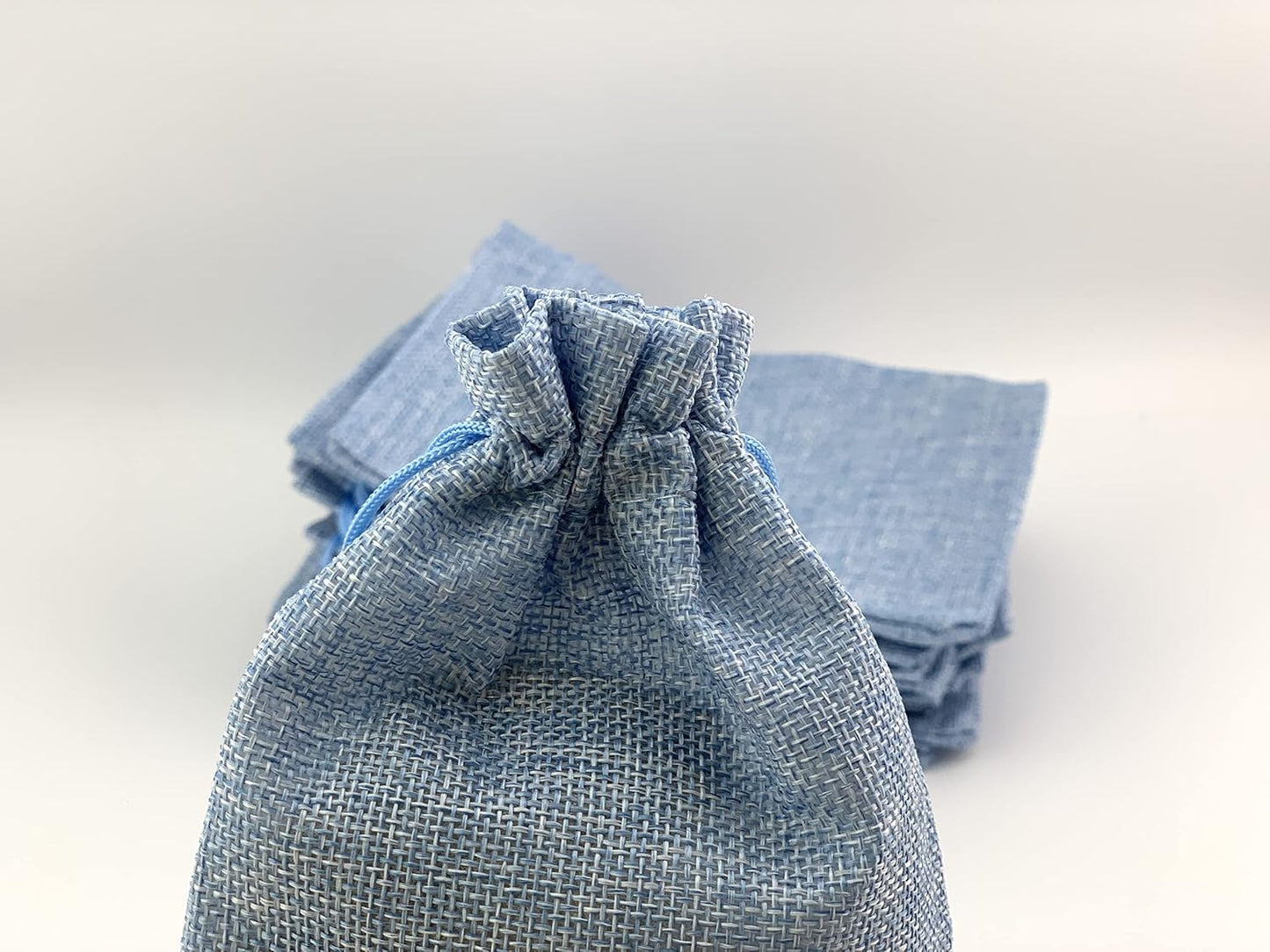 Palmhomee Pack of 25 Burlap Gift Bags with Drawstring Linen Jewelry Pouches Wedding Hessian Jute Bags for Birthday and Treat Pouches Party Wedding Favors Gift (7x9 Inch, Sky Blue)